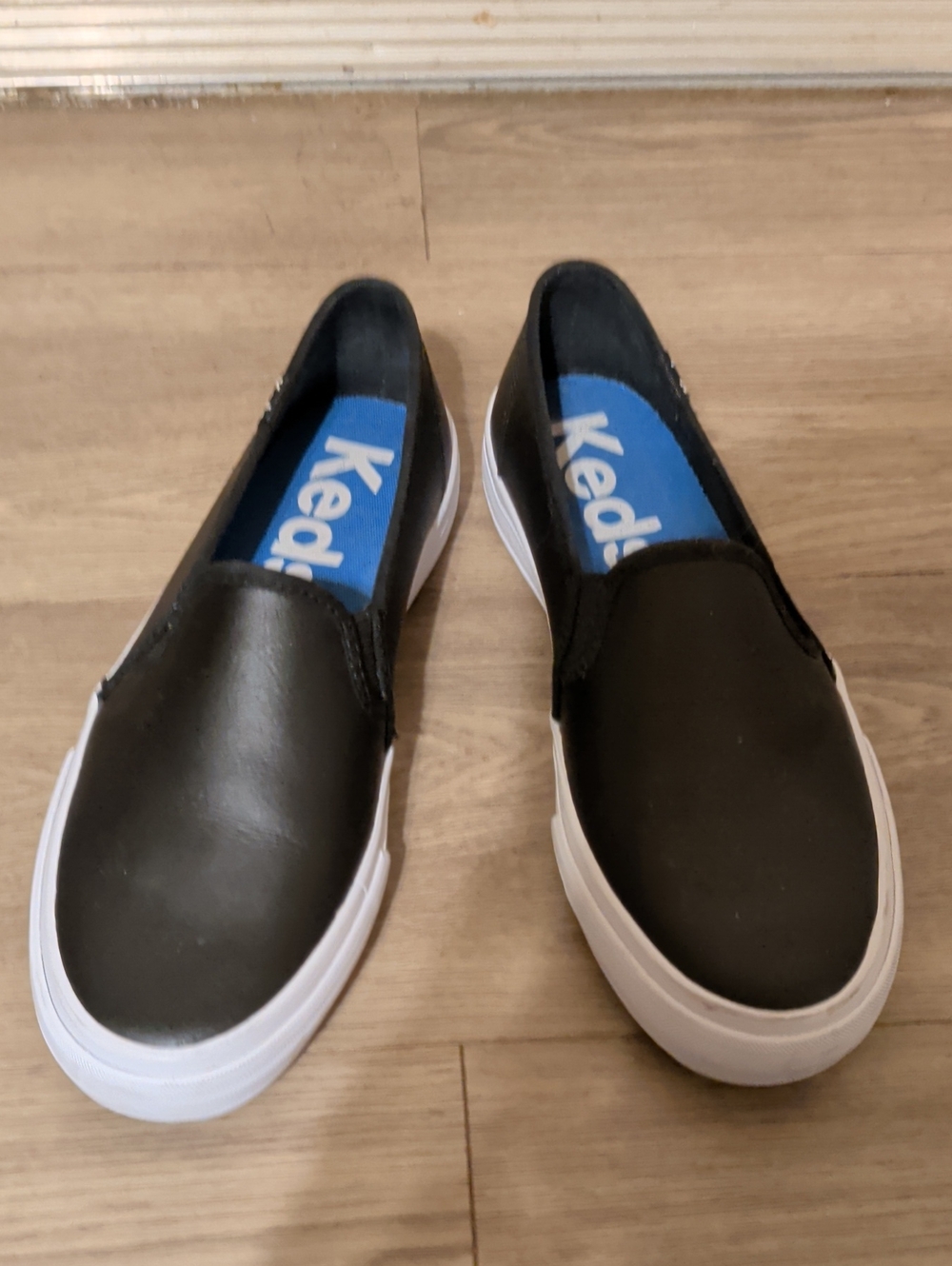 Keds  Black Slip-On Sneakers with White Sole